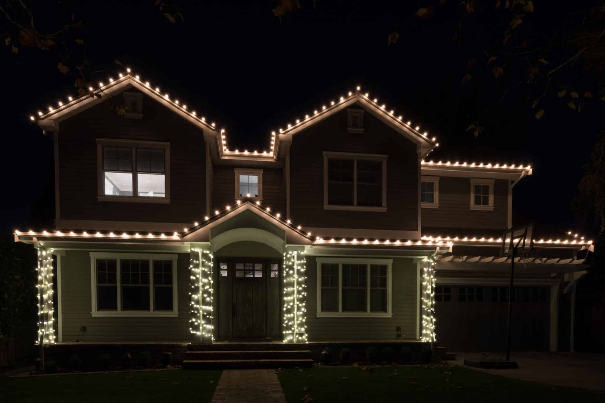 Commercial business decorated with festive holiday wreaths and lights